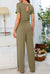 Round Neck Open Back Jumpsuit with Pockets Preorder